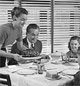 1940's family eating together at the table